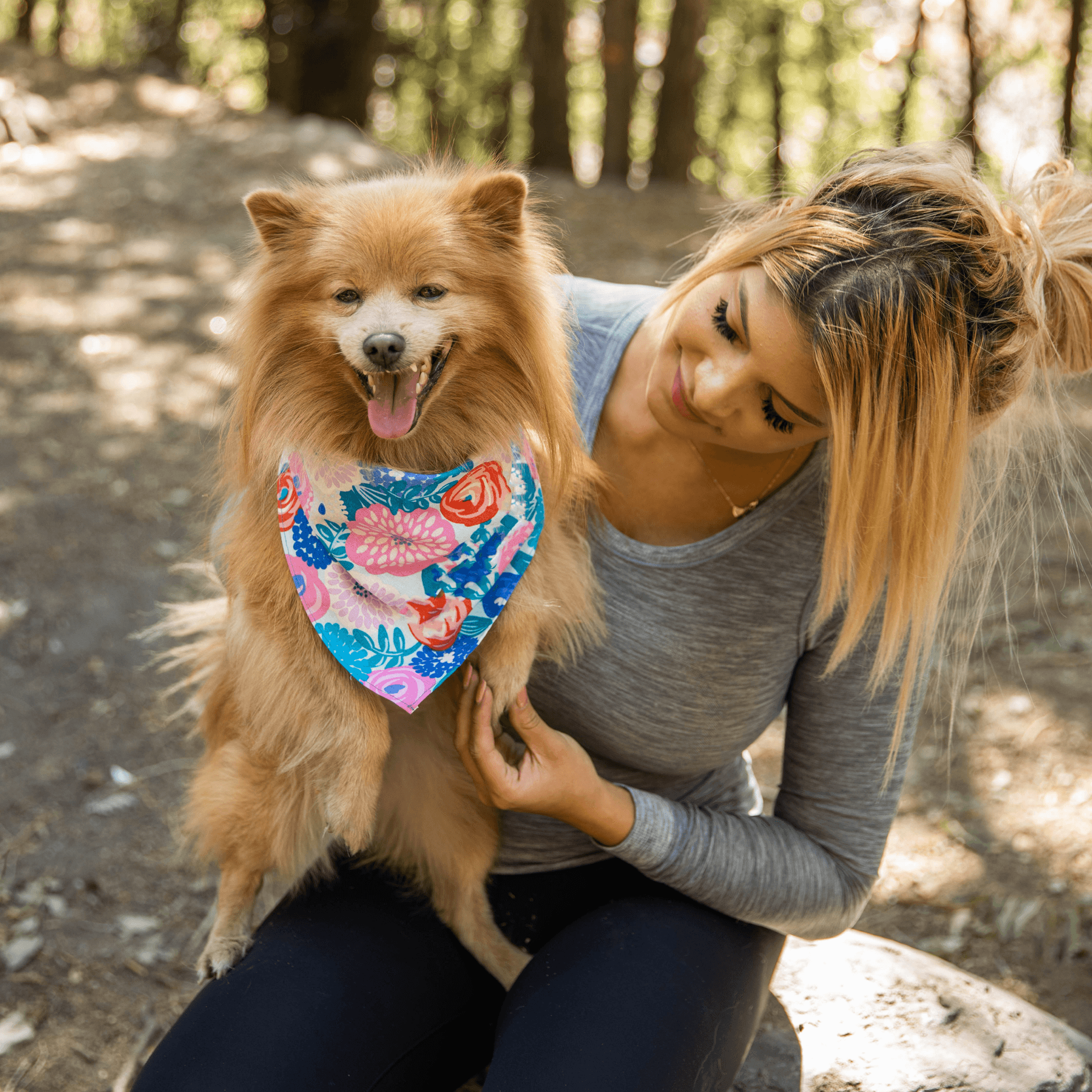 dog wearing customized bandana with owner