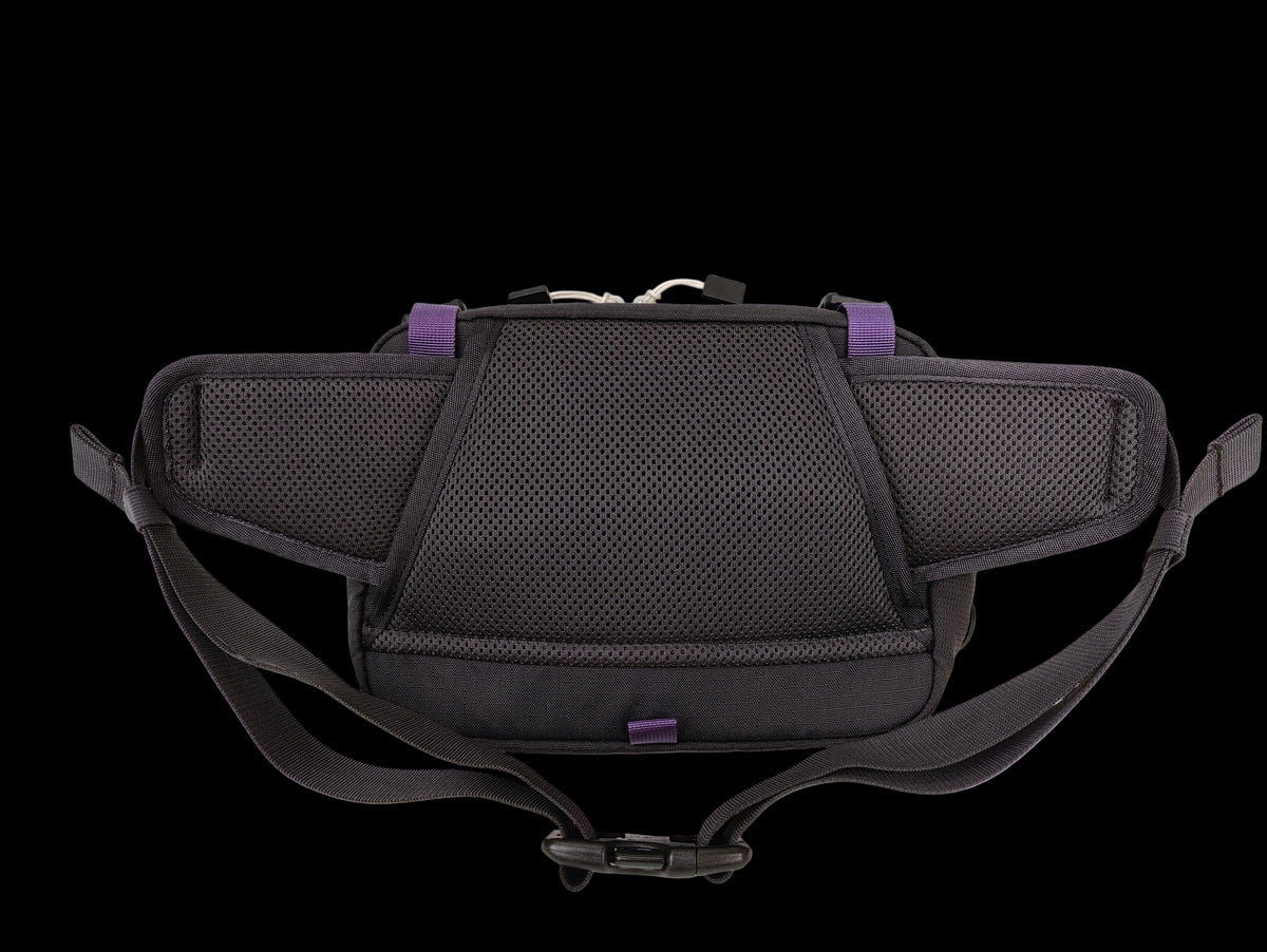 Black mesh and fabric waist bag with adjustable straps and small purple accent details, shown against a plain white background.
